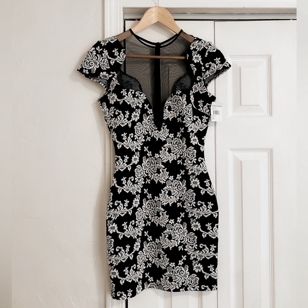 Black & white floral mini dress. One Rad Girl by Dress the Population. Small